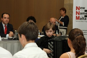 11 year old Rostislav Mudritskiy on the accordian performing during the launch of the Clssical Young Stars Concert Series